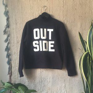 'Out Side" Wool Mock Neck Sweater
